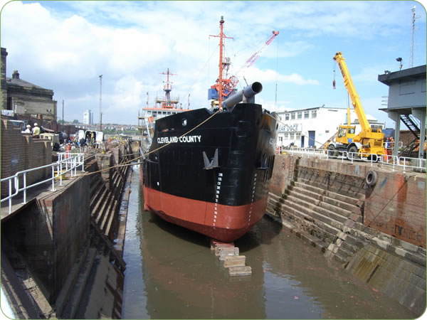 Water balsting to clean ships prior to painting